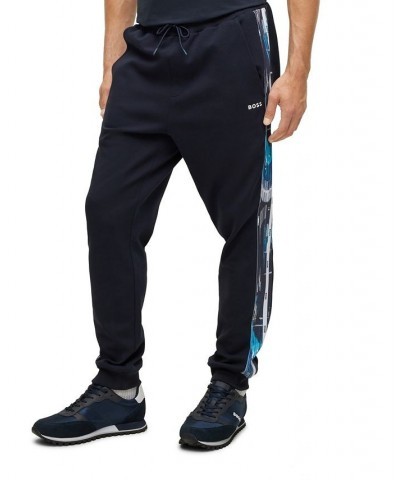 BOSS Men's Patterned Logo Inserts Relaxed-Fit Tracksuit Bottoms Blue $63.92 Pants