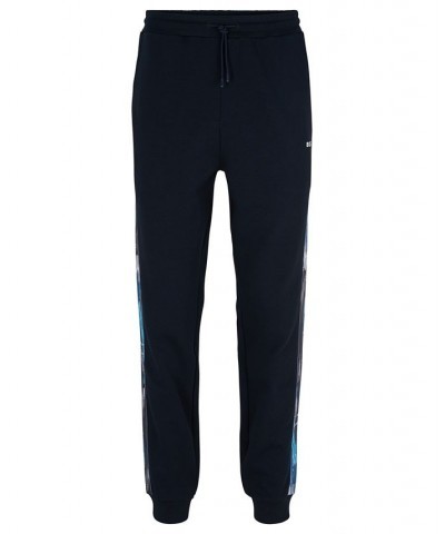 BOSS Men's Patterned Logo Inserts Relaxed-Fit Tracksuit Bottoms Blue $63.92 Pants